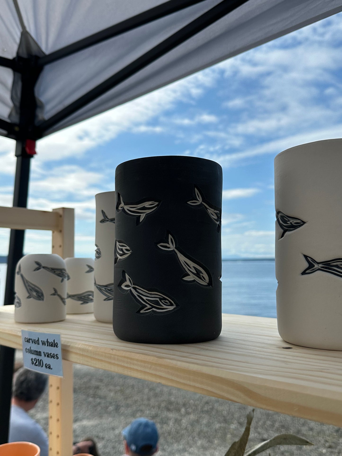 carved whale column vases